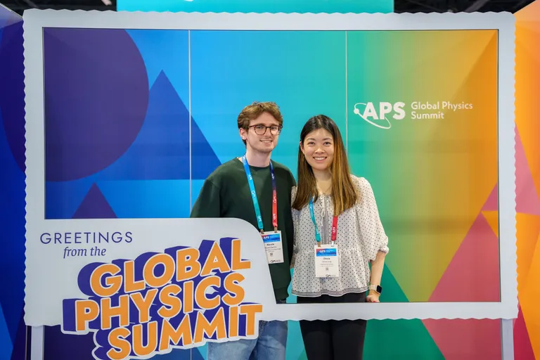 Two young meeting attendees at Global Physics Summit