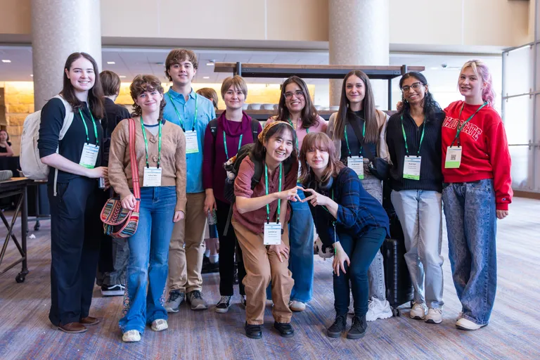 Attendees interact during a session