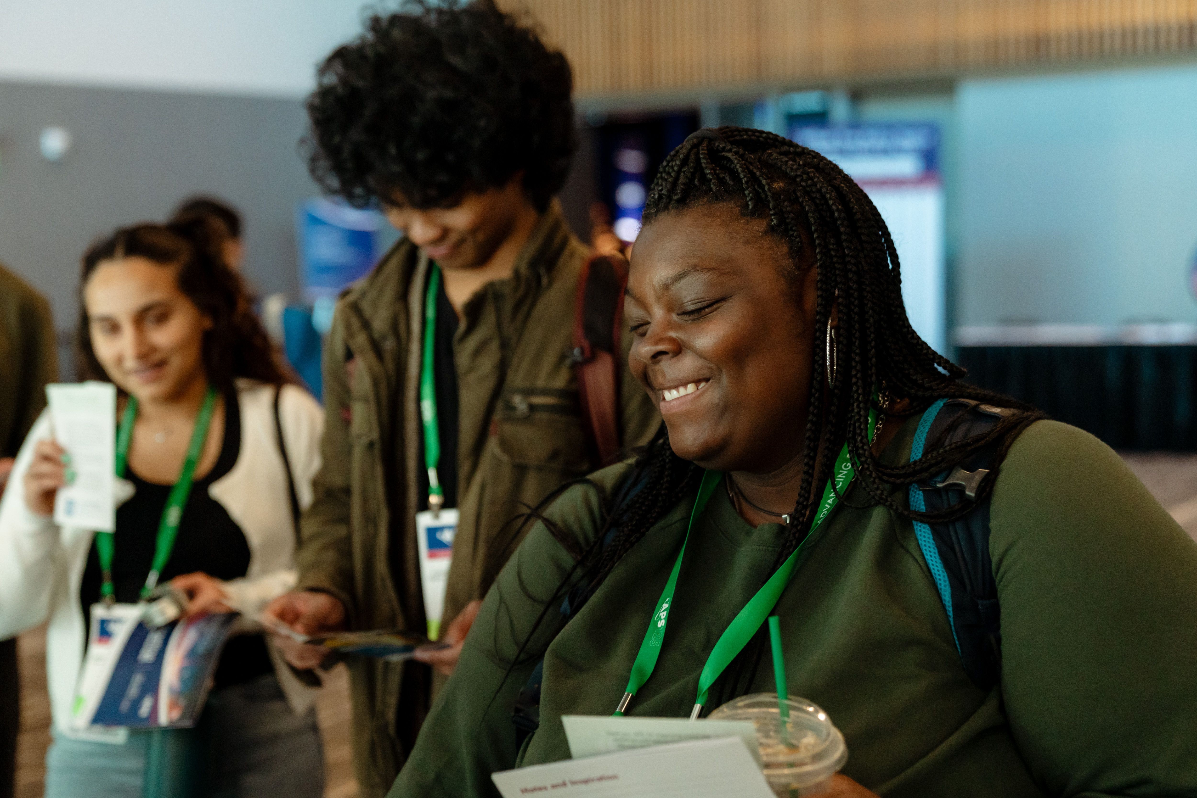 Attendees visiting Career Fair booths. 